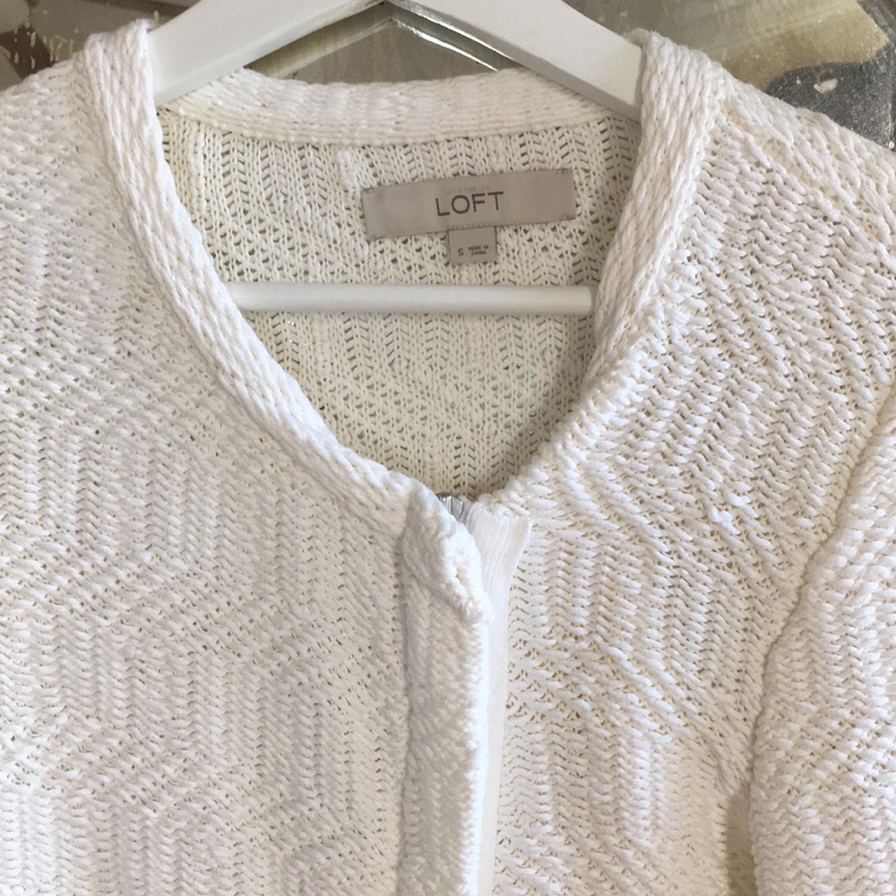 Moto style sweater/jacket.